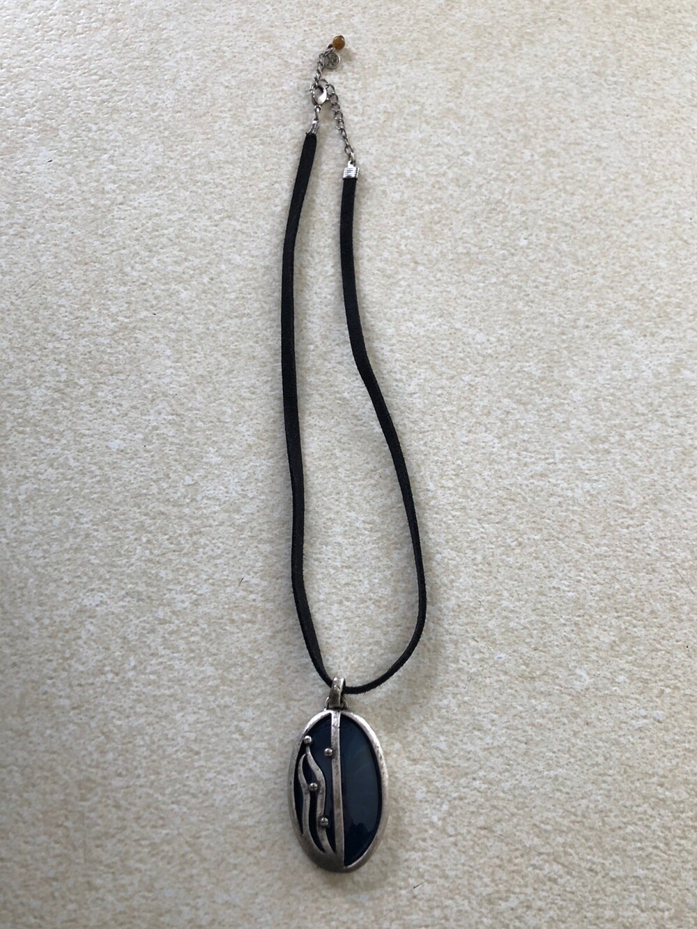 Xiomara Castro Necklace Black Cord Blue Stone Oval Pendant Silver Tone Antiqued